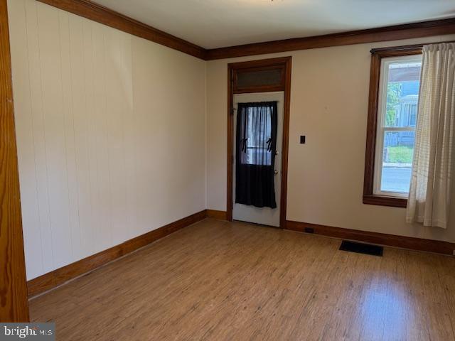 411 East Chestnut Street Lebanon, PA 17042 - Photo 31 of 48 an empty room with wooden floor and windows