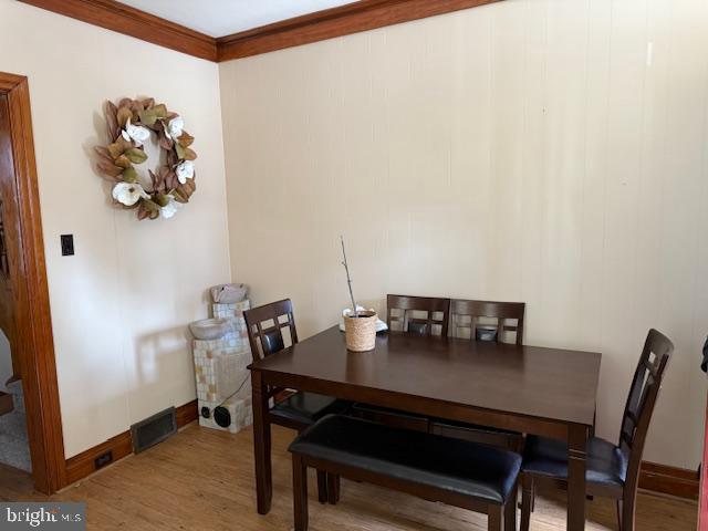 411 East Chestnut Street Lebanon, PA 17042 - Photo 9 of 48 a view of a workspace with a table and chairs in a room