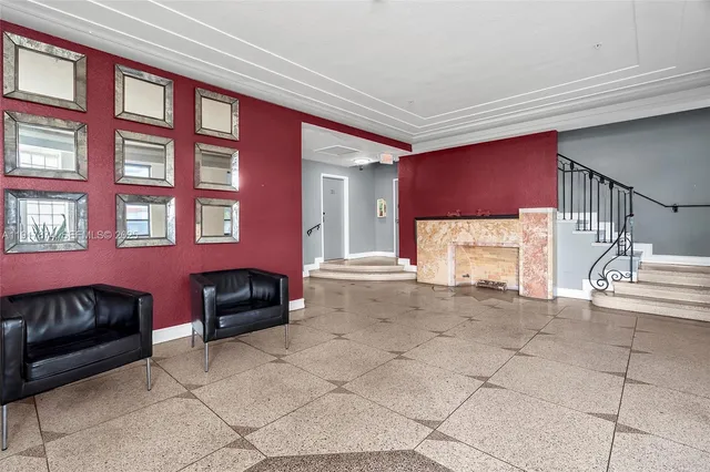a view of livingroom with furniture and windows