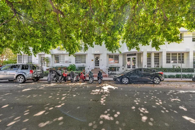 front view of a building with a bench