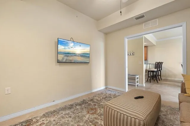 a view of livingroom with furniture and workspace