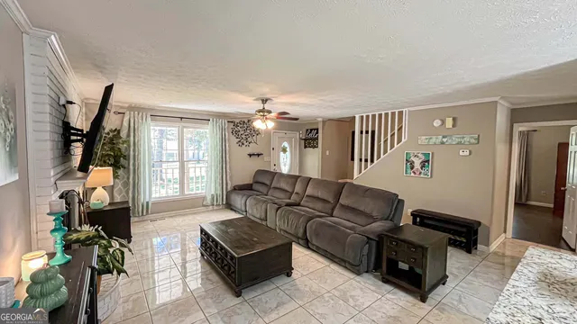 a bed room with a bed and a chandelier