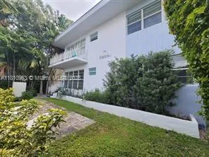 a view of a garden with a bench
