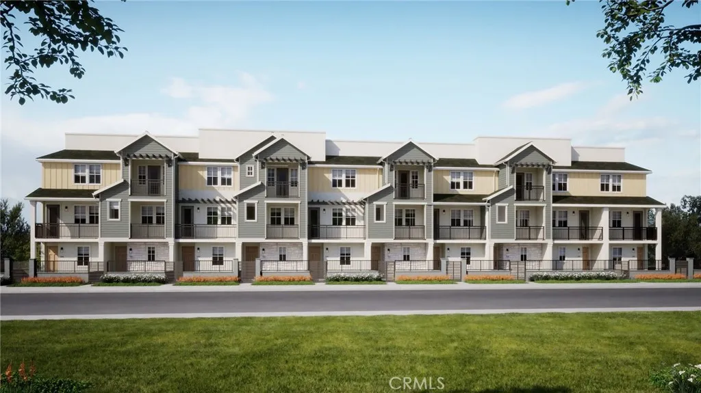 front view of a large building with a yard