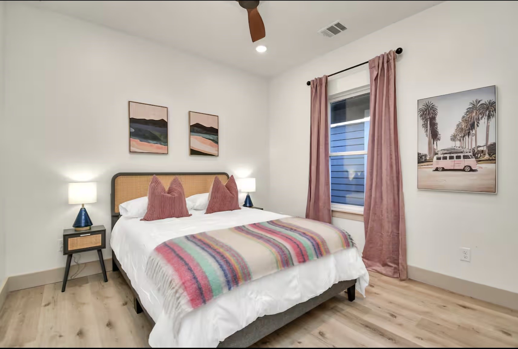 442 6th Street Dickinson, TX 77539 - Photo 21 of 29 a bedroom with a bed and a painting on the wall