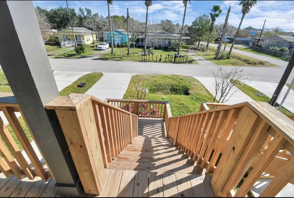 a view of swimming pool with seating space