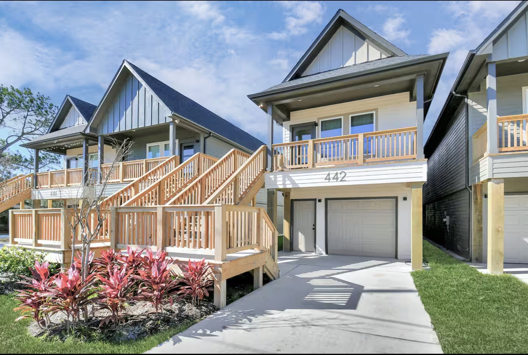 442 6th Street Dickinson, TX 77539 - Photo 27 of 29 a front view of a house with a yard and a garage