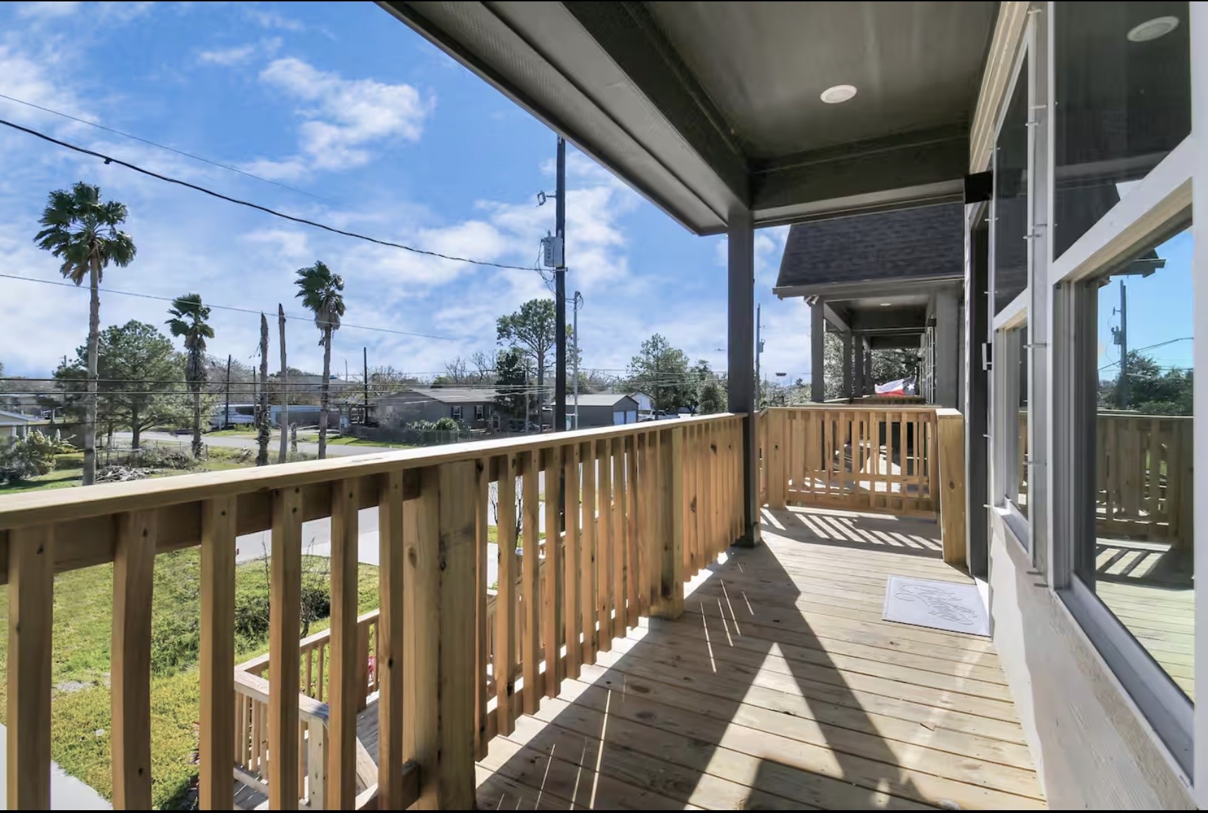 442 6th Street Dickinson, TX 77539 - Photo 5 of 29 a view of a balcony with wooden floor