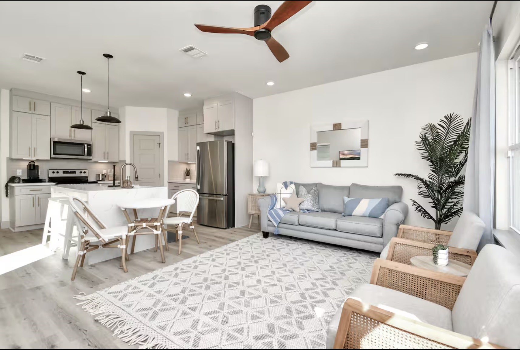 442 6th Street Dickinson, TX 77539 - Photo 6 of 29 a living room with furniture and kitchen view