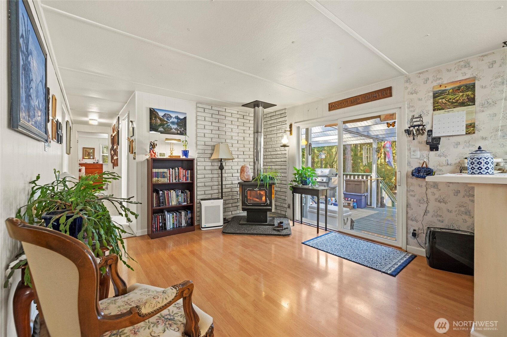 3167 Hunt Road Oak Harbor, WA 98277 - Photo 17 of 40 a living room with furniture and a fireplace
