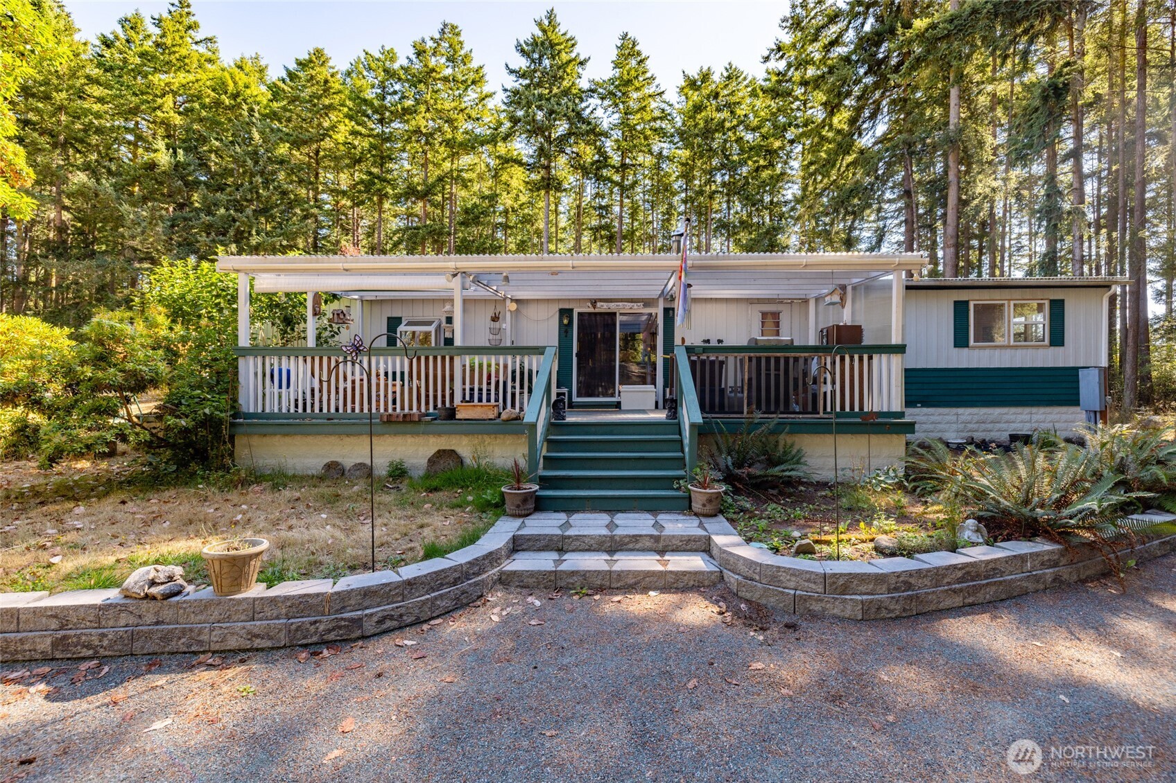 3167 Hunt Road Oak Harbor, WA 98277 - Photo 4 of 40 a view of a house with sitting area and garden
