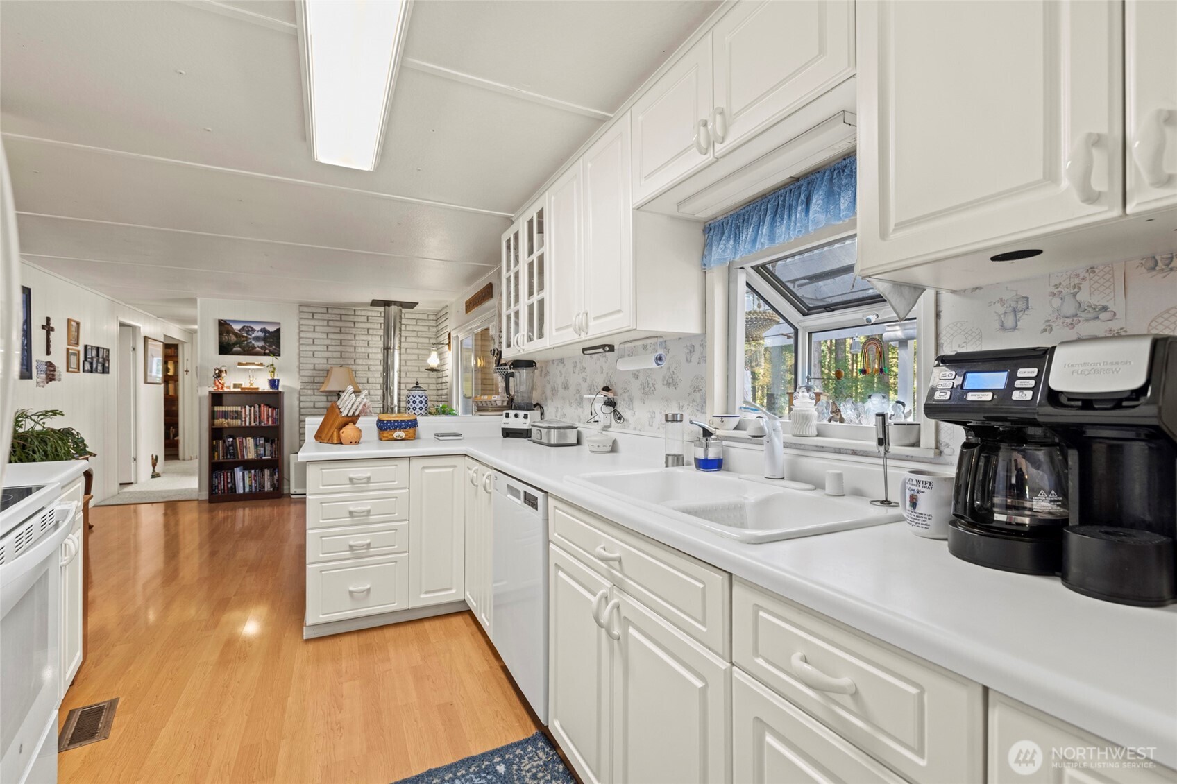 3167 Hunt Road Oak Harbor, WA 98277 - Photo 6 of 40 a kitchen with cabinets and appliances