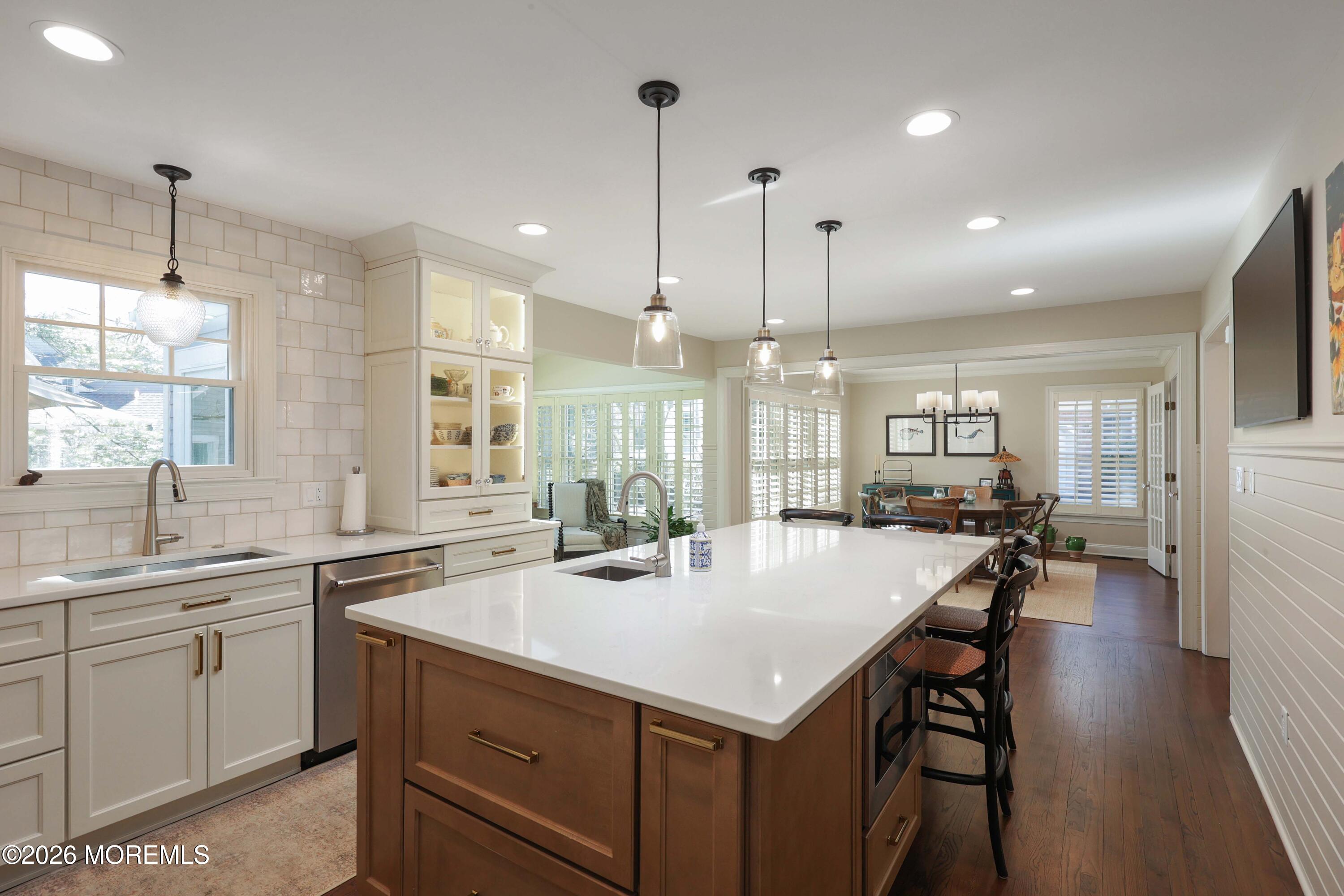13 Country Lane Little Silver, NJ 07739 - Photo 12 of 42 a kitchen with center island and stainless steel appliances