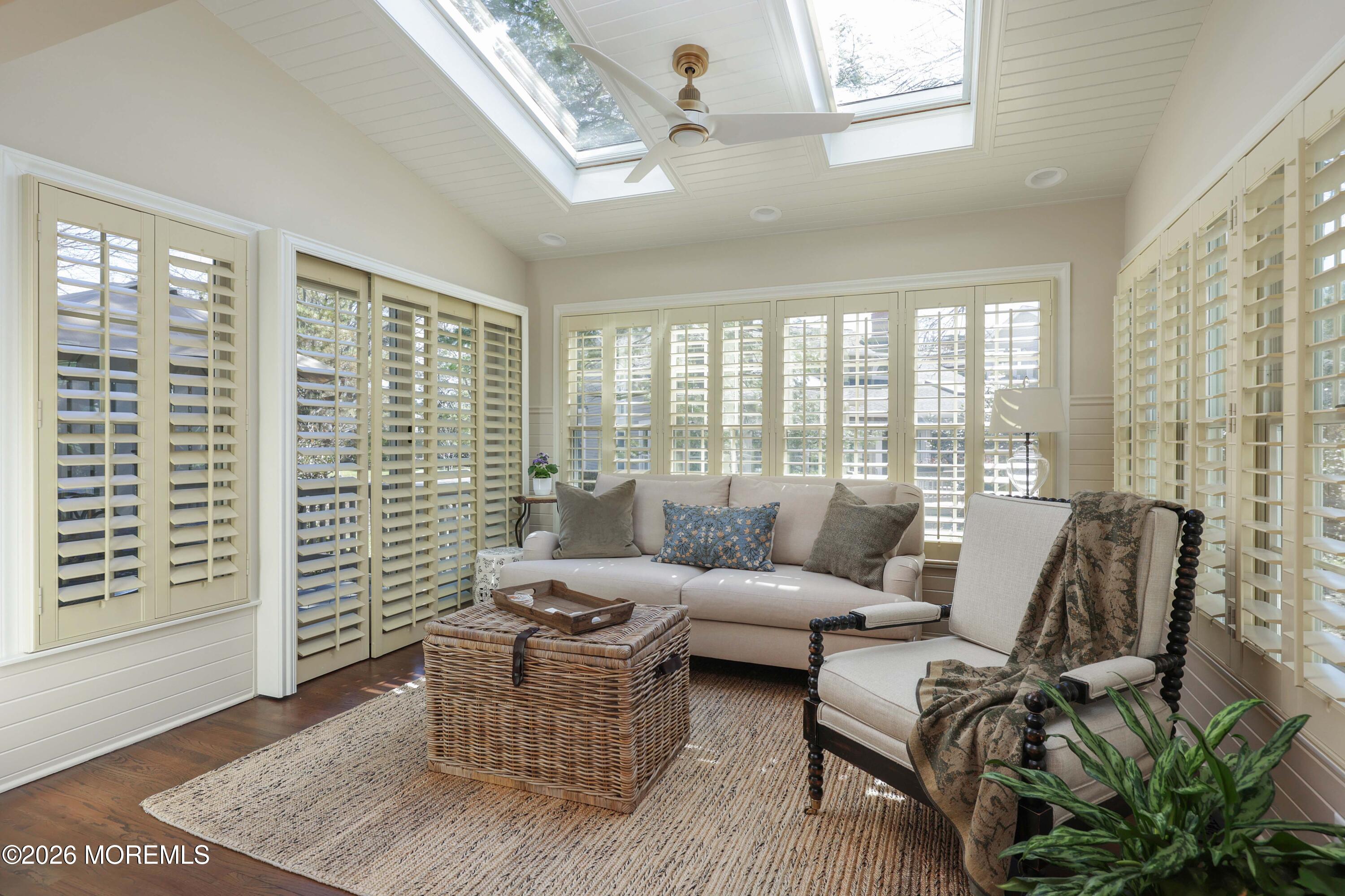 13 Country Lane Little Silver, NJ 07739 - Photo 14 of 42 a living room with furniture and floor to ceiling windows