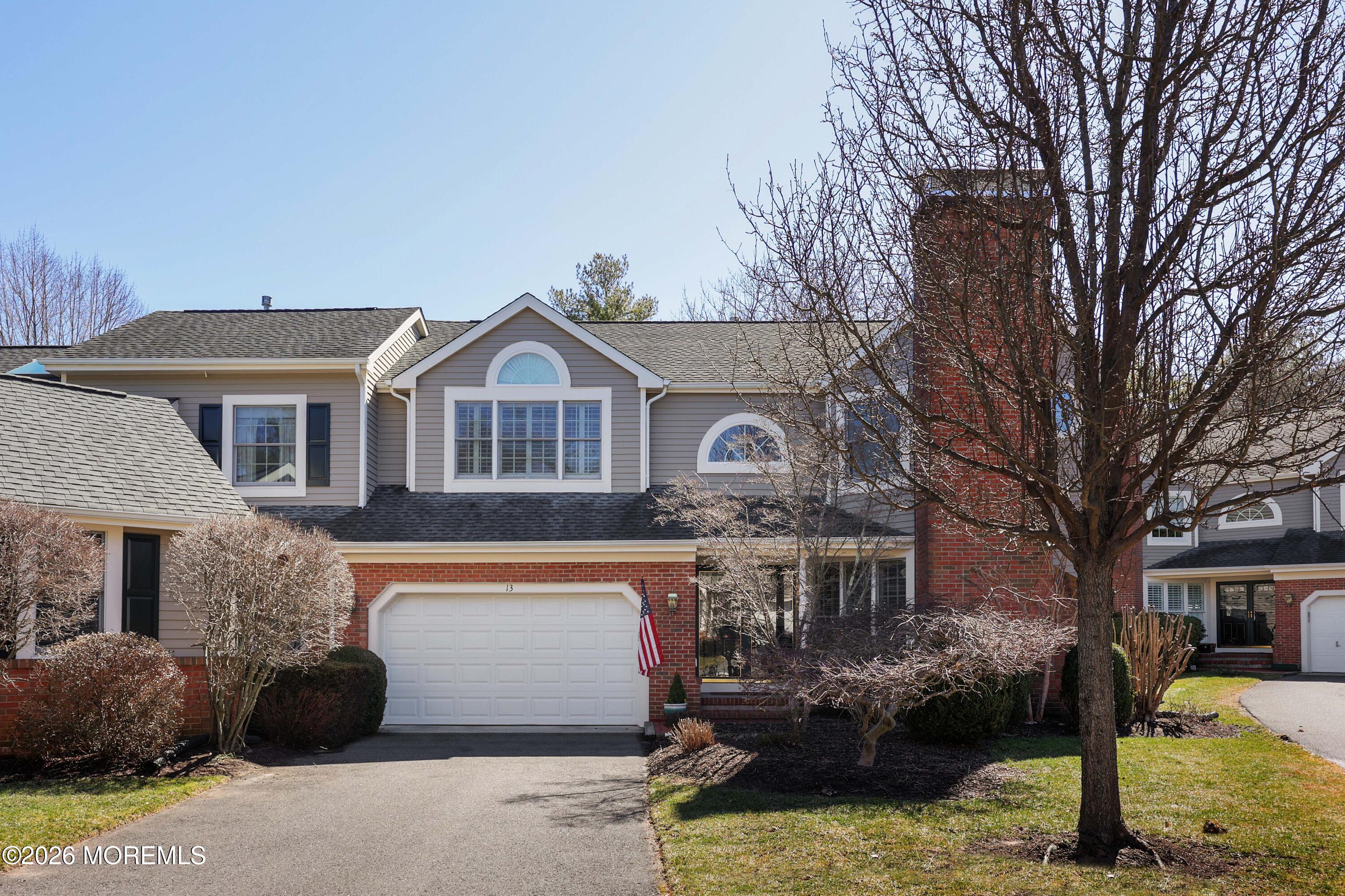 13 Country Lane Little Silver, NJ 07739 - Photo 2 of 42 a front view of a house with a yard