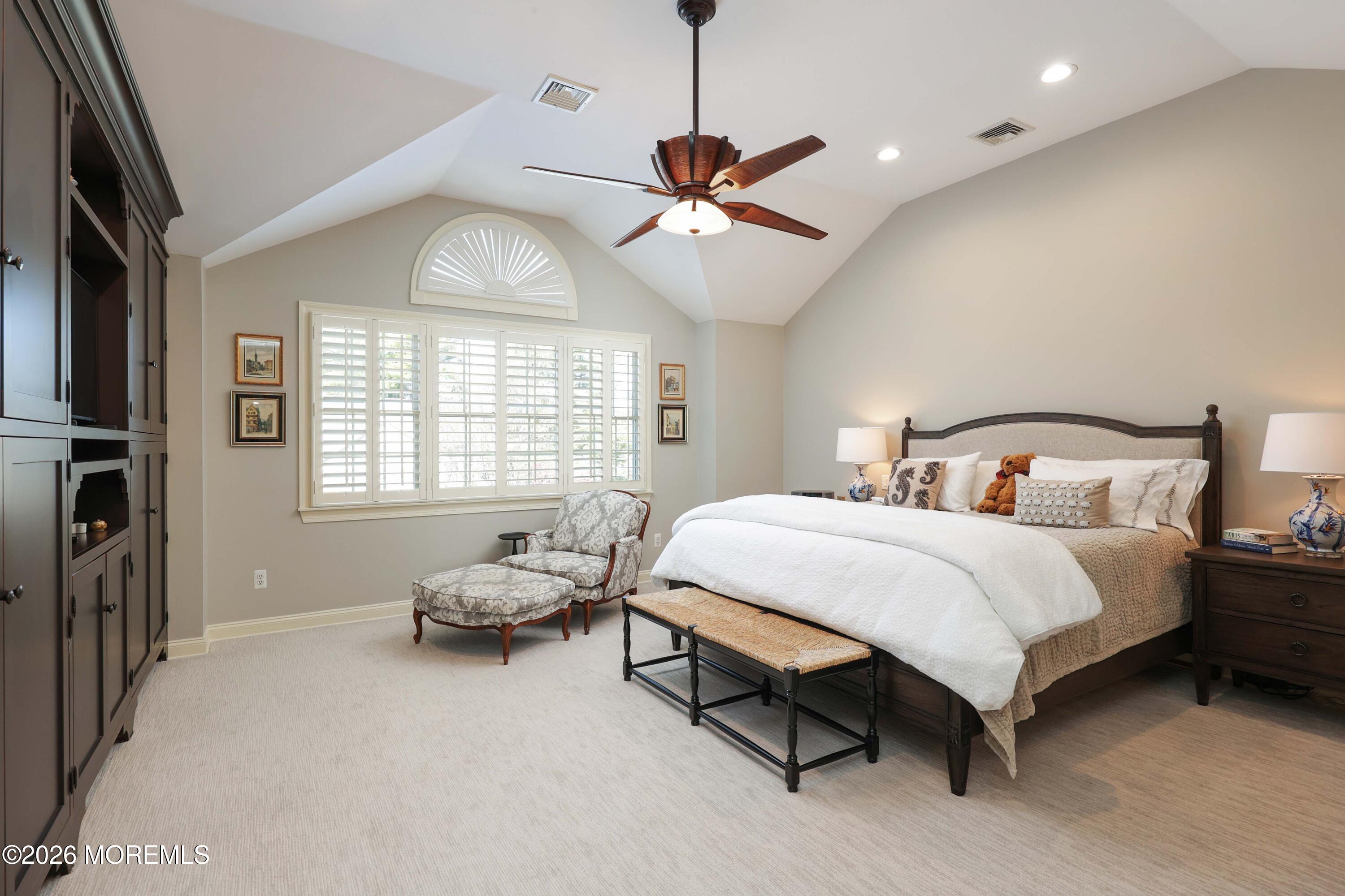 13 Country Lane Little Silver, NJ 07739 - Photo 21 of 42 a bedroom with a bed and a chandelier