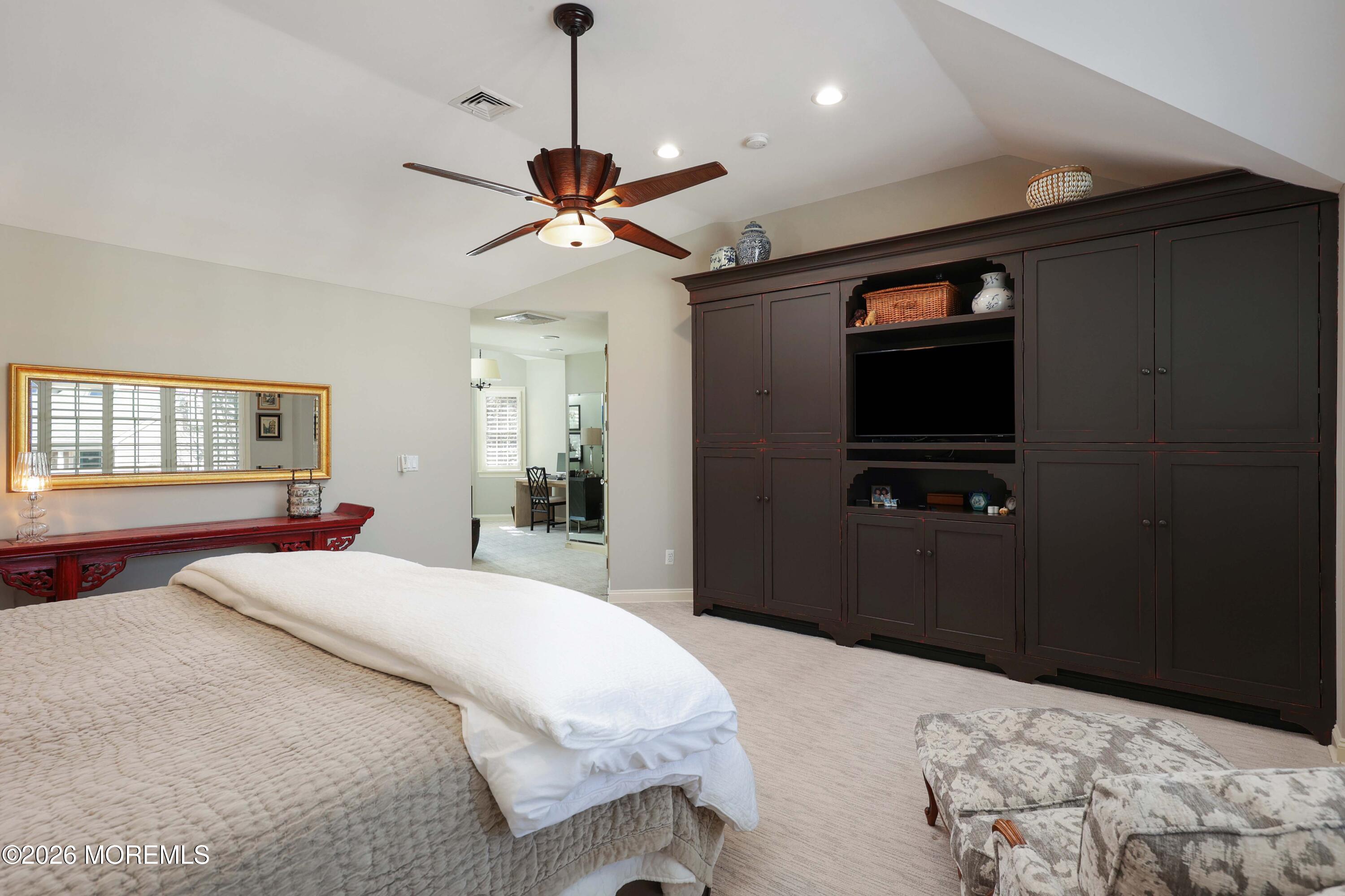 13 Country Lane Little Silver, NJ 07739 - Photo 22 of 42 a bedroom with a bed and a flat screen tv