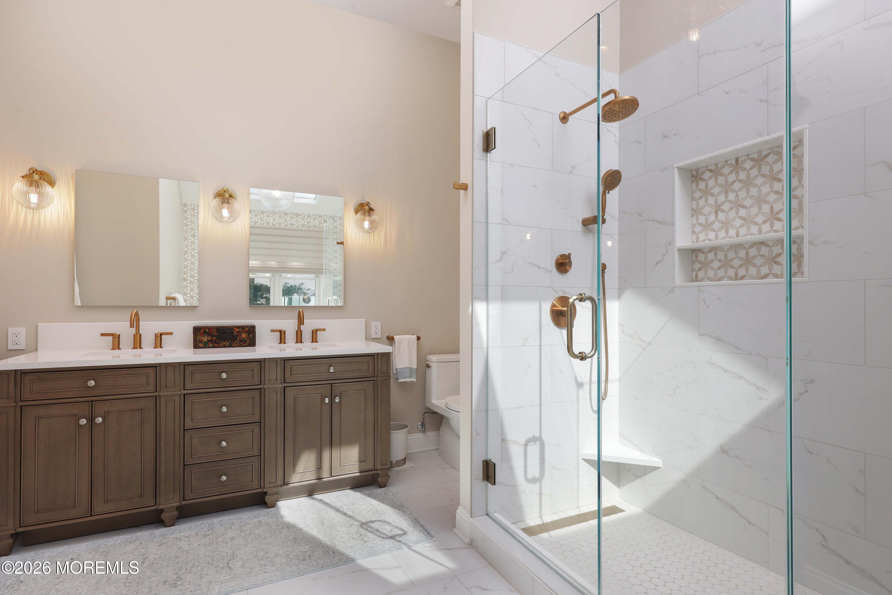 13 Country Lane Little Silver, NJ 07739 - Photo 23 of 42 a spacious bathroom with a double vanity sink a mirror and shower