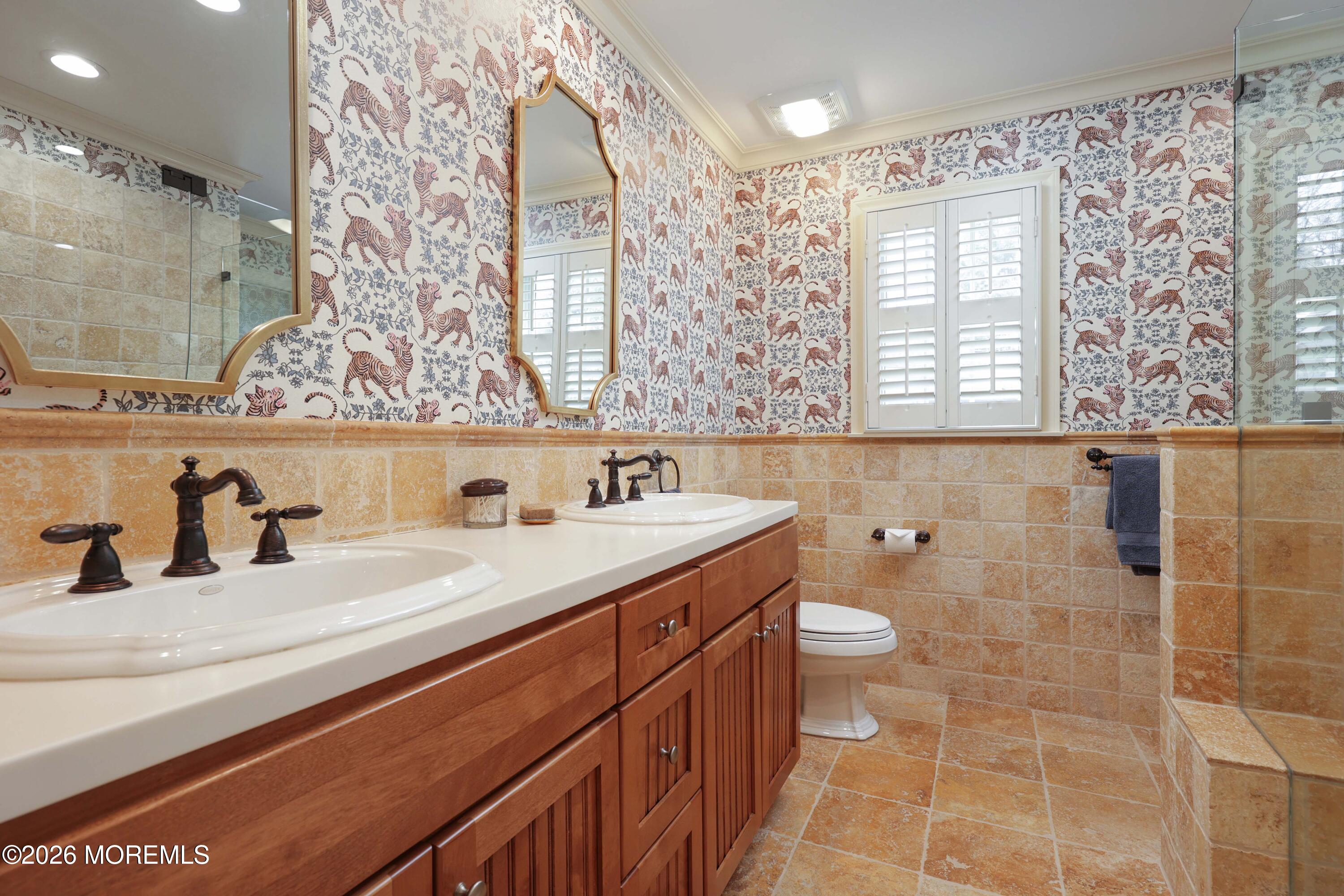 13 Country Lane Little Silver, NJ 07739 - Photo 28 of 42 a bathroom with a double vanity sink toilet and a mirror