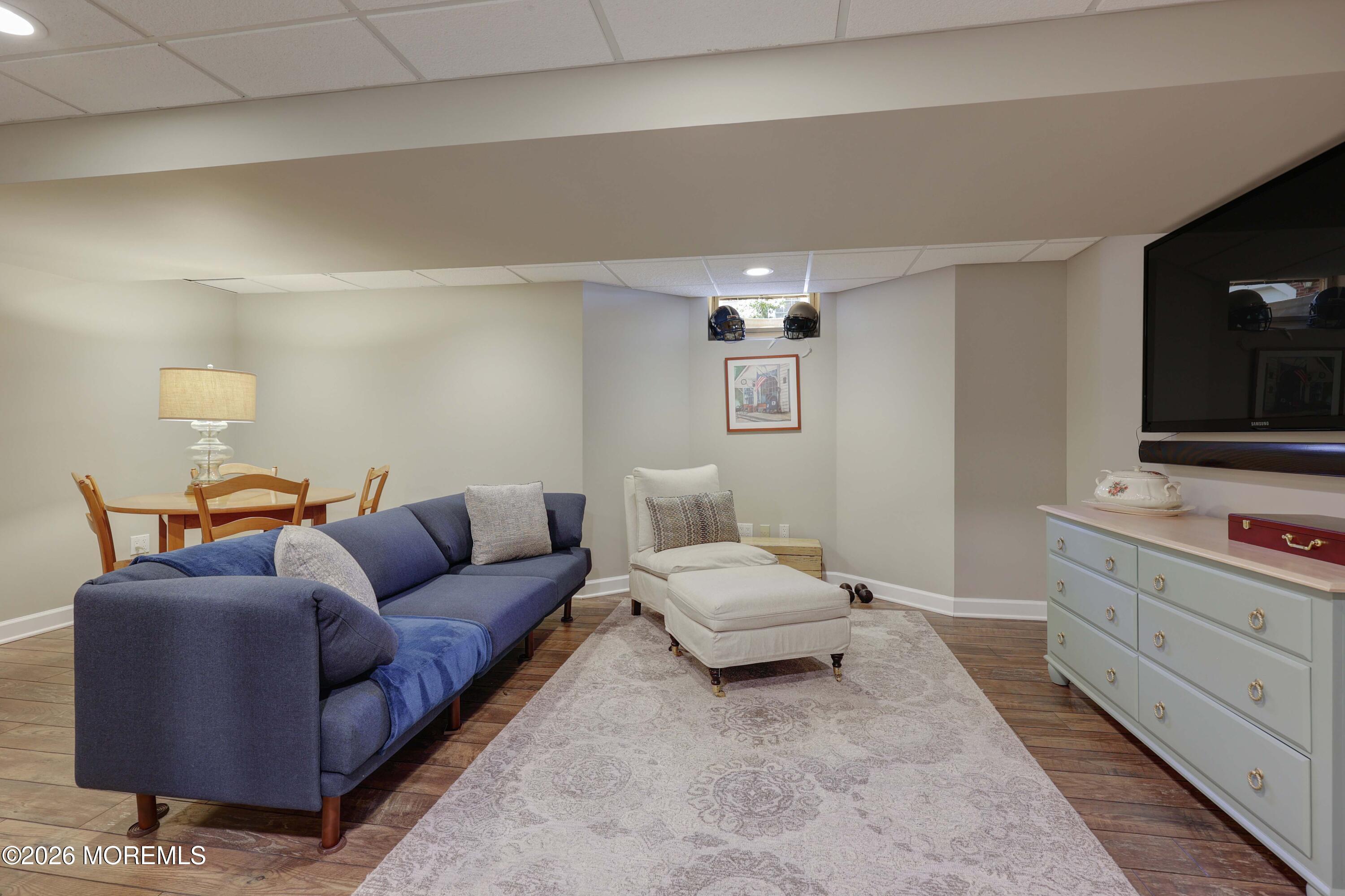 13 Country Lane Little Silver, NJ 07739 - Photo 30 of 42 a living room with furniture and a flat screen tv