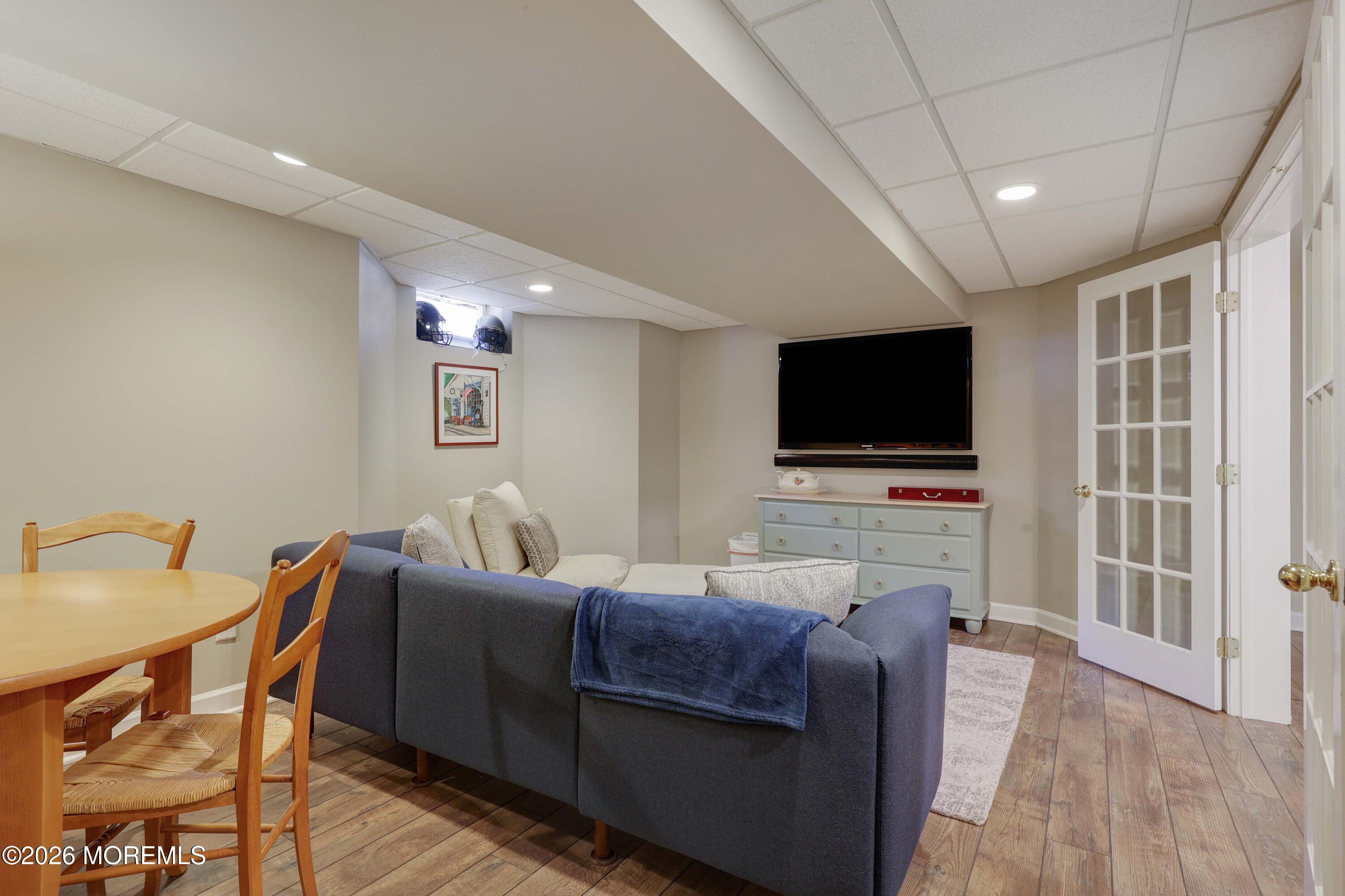 13 Country Lane Little Silver, NJ 07739 - Photo 31 of 42 a living room with furniture and a flat screen tv