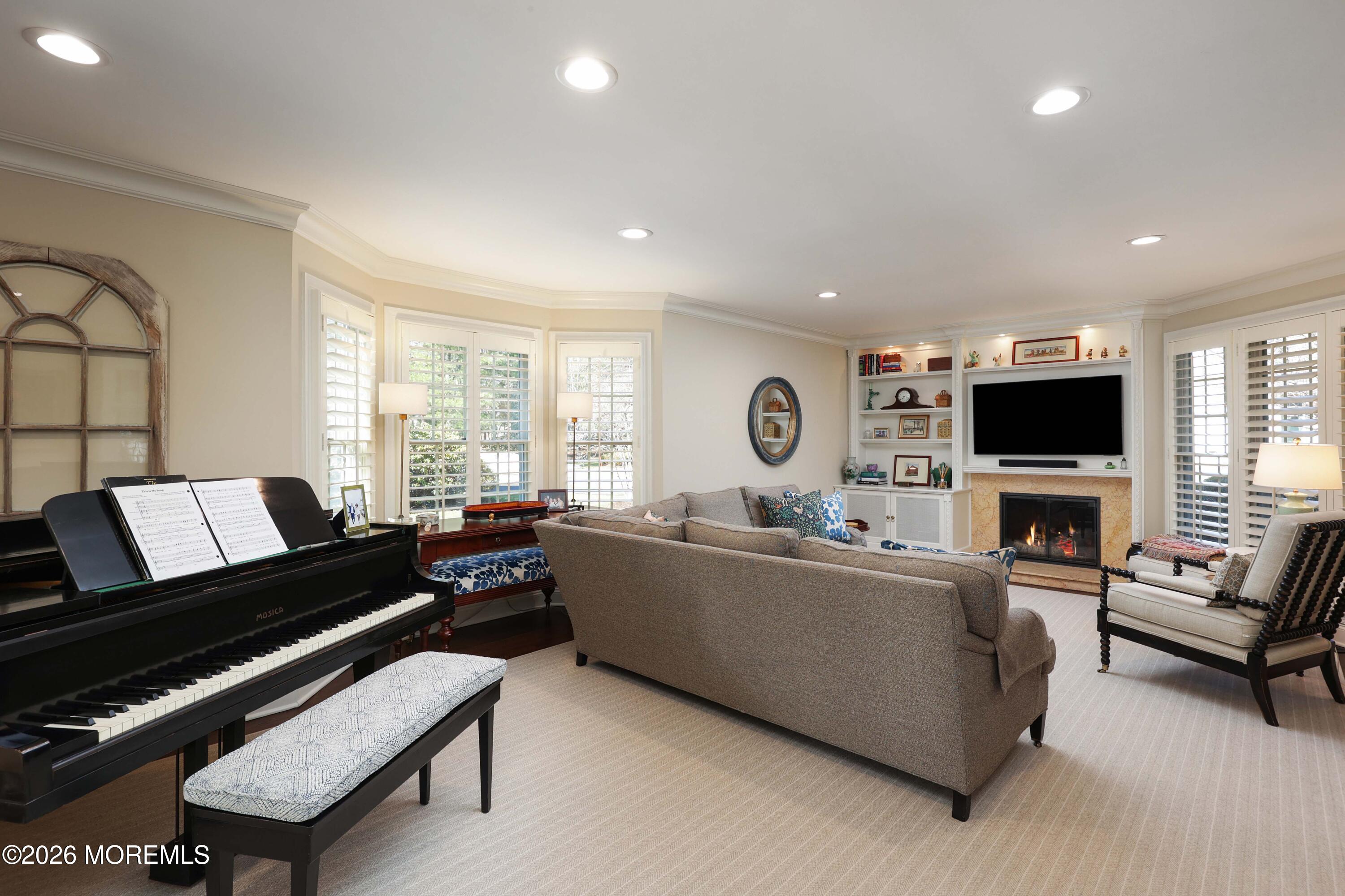 13 Country Lane Little Silver, NJ 07739 - Photo 4 of 42 a living room with furniture and a flat screen tv
