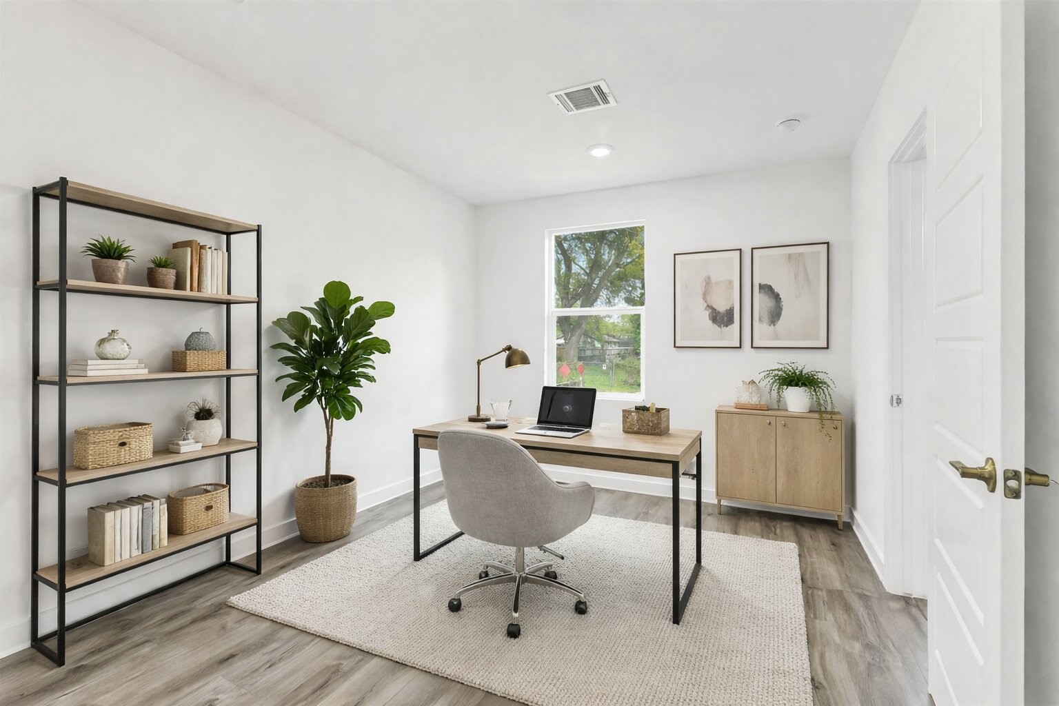 110 Harris Court Houston, TX 77009 - Photo 23 of 31 This bright, virtually staged home office demonstrates a functional and modern workspace, complete with stylish flooring and a large window that brings in refreshing views.