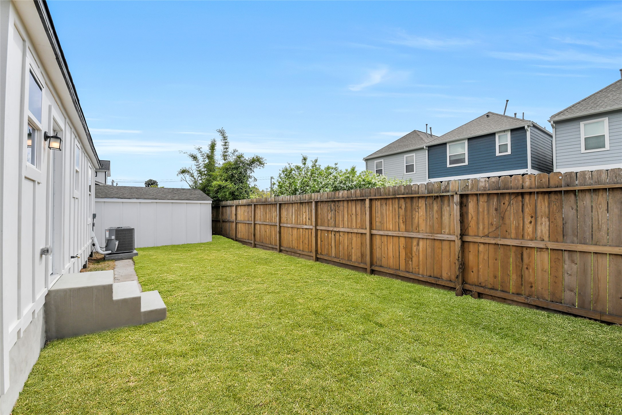 110 Harris Court Houston, TX 77009 - Photo 27 of 31 A fully fenced and spacious backyard providing a secure and private setting for gardening, play, or entertaining.