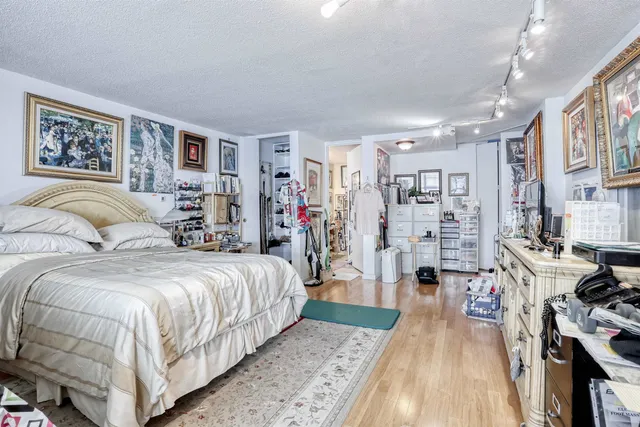 a view of a balcony with wooden floor and outdoor space
