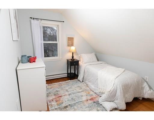 107 Groton School Road Ayer, MA 01432 - Photo 21 of 25 a bedroom with a bed and a window