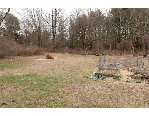 107 Groton School Road Ayer, MA 01432 - Photo 23 of 25 a view of a dry yard with trees