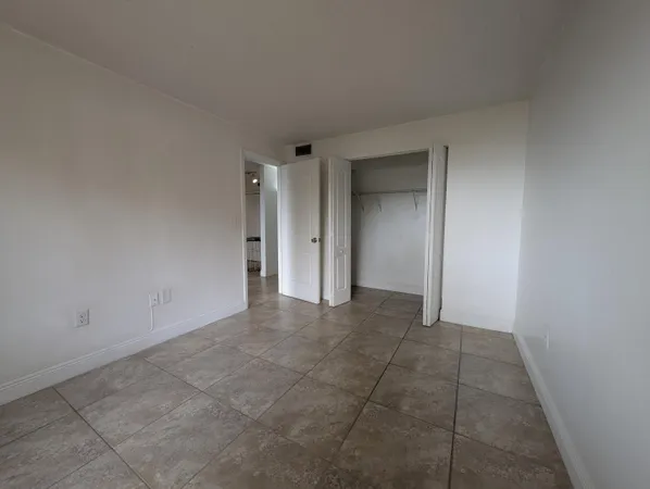 an empty room with an entryway