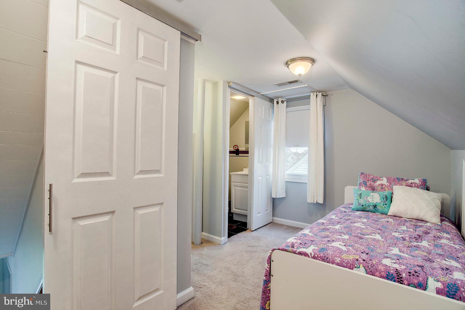 8110 Murray Point Road Baltimore, MD 21222 - Photo 22 of 27 Upper Level Bedrm 2 w/ Sliding doors and half bath