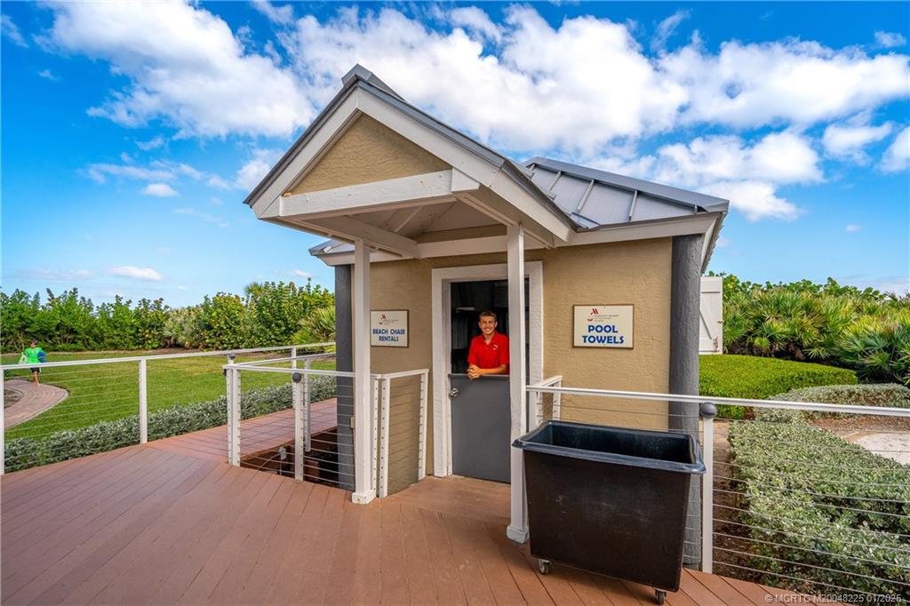 319 Golfview Circle, Unit 319 Stuart, FL 34996 - Photo 52 of 56 a front view of a house with porch