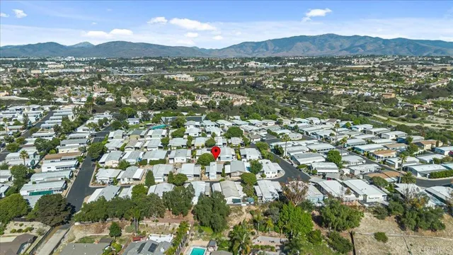 a view of mountain with yard