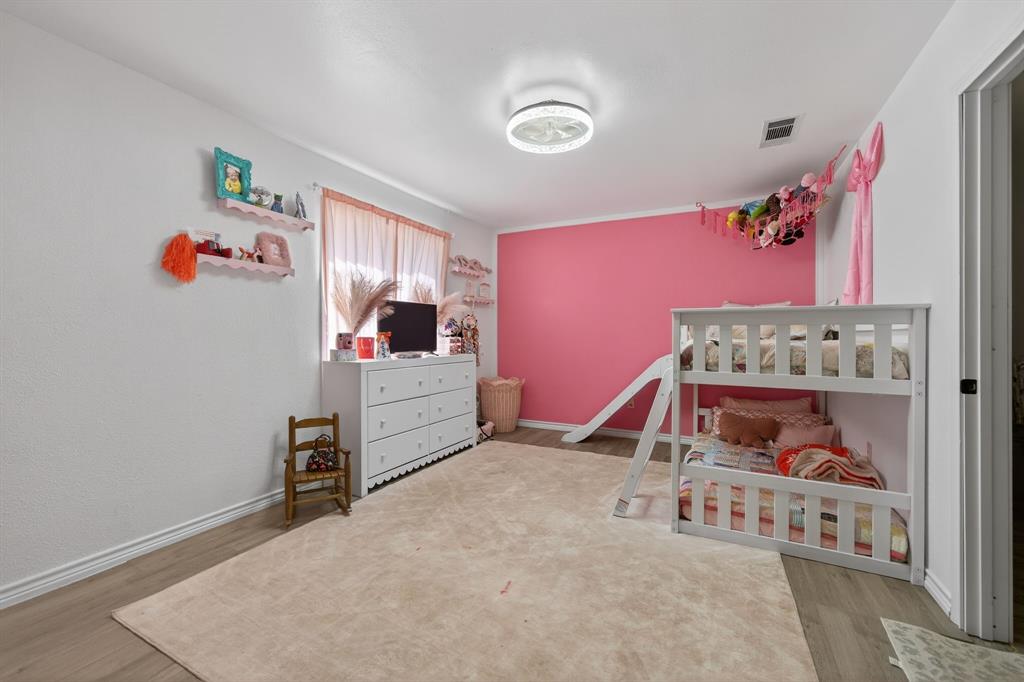 11474 Farm To Market 3094 Scurry, TX 75158 - Photo 19 of 40 a room with toys and dresser