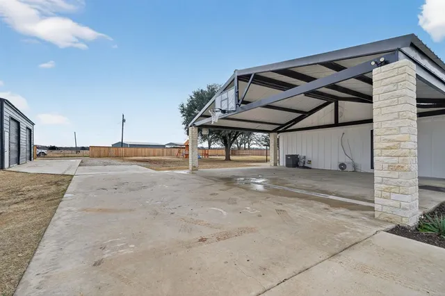 a view of a house with a street