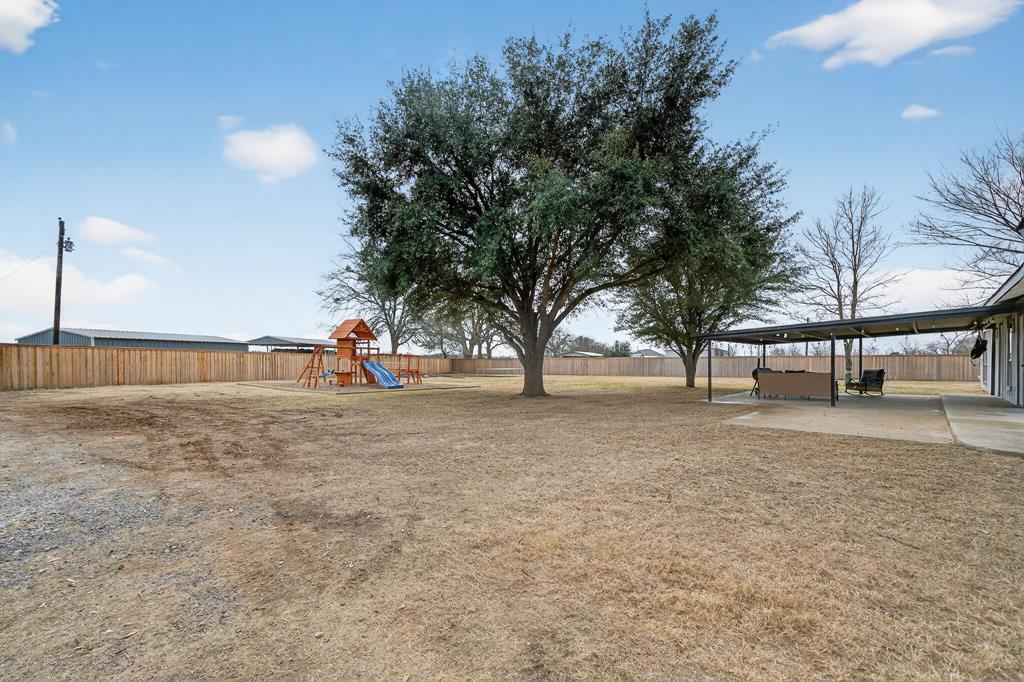 11474 Farm To Market 3094 Scurry, TX 75158 - Photo 31 of 40 a view of outdoor space with trees