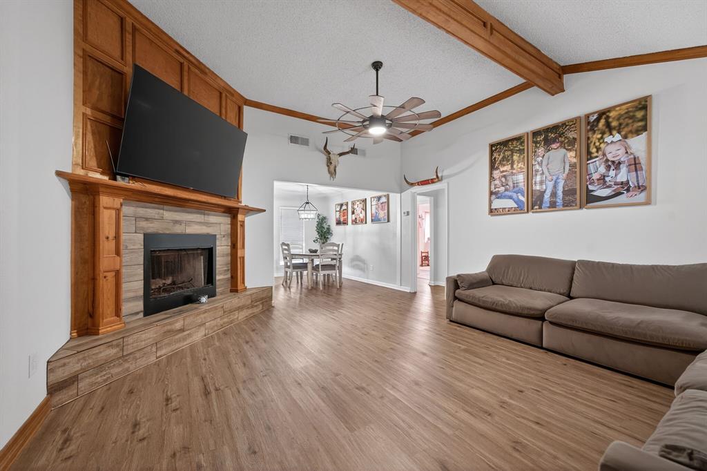 11474 Farm To Market 3094 Scurry, TX 75158 - Photo 7 of 40 a living room with furniture and a fireplace