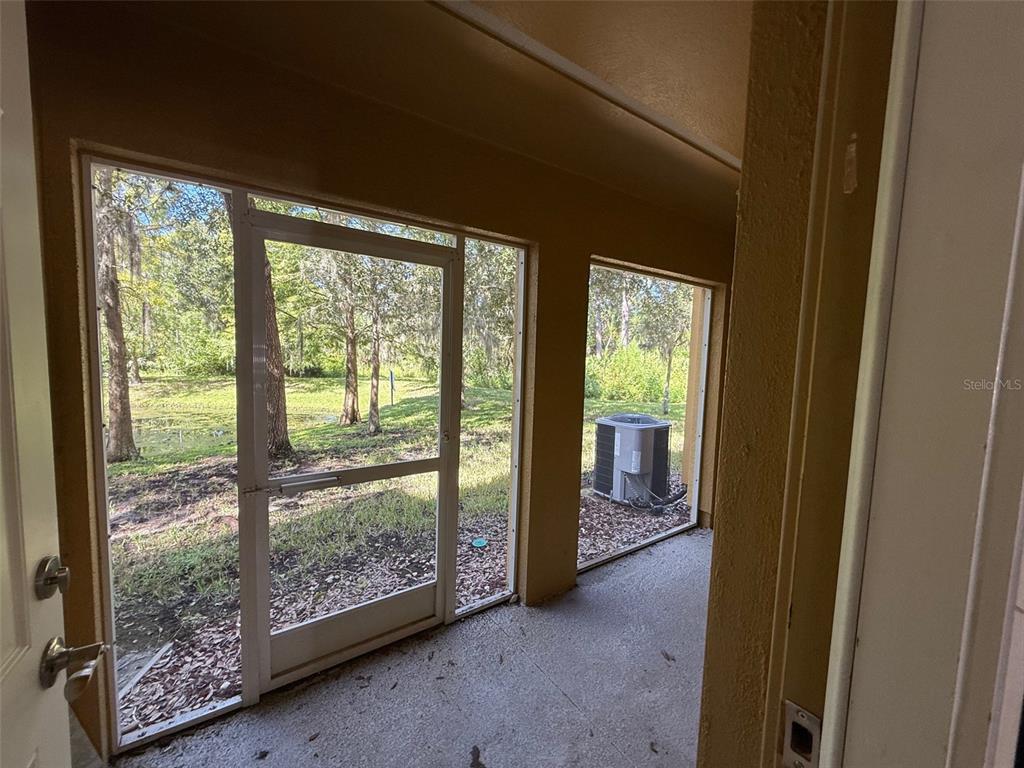 7350 Black Walnut Way Lakewood Ranch, FL 34202 - Photo 41 of 52 a view of hallway with furniture and balcony