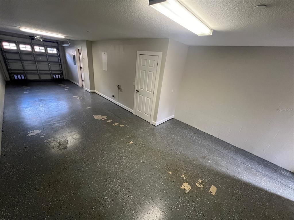 7350 Black Walnut Way Lakewood Ranch, FL 34202 - Photo 42 of 52 a view of a garage