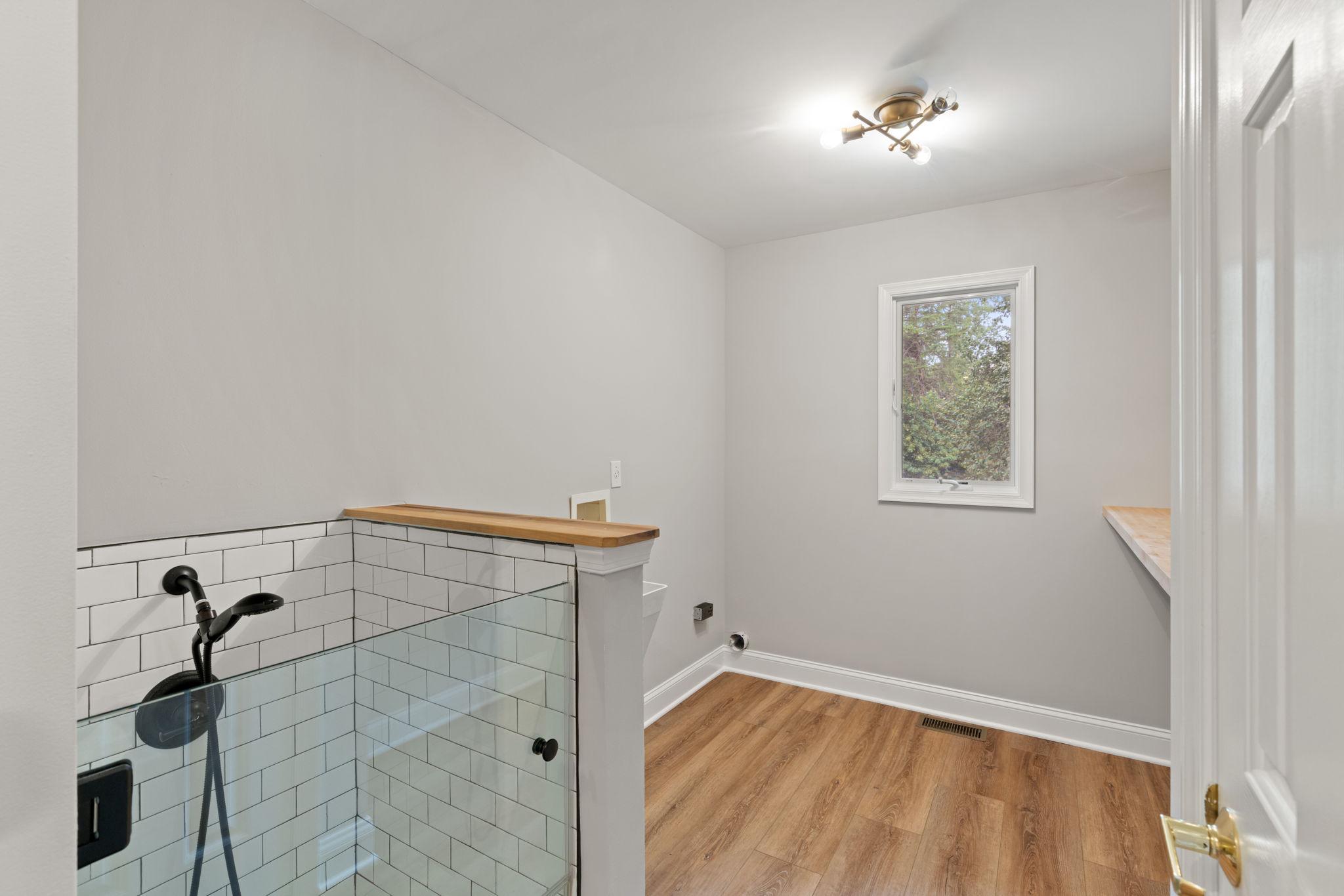 19 Winning Colors Road Stafford, VA 22556 - Photo 32 of 58 Laundry Room with Custom Tiled Pet-Wash Station
