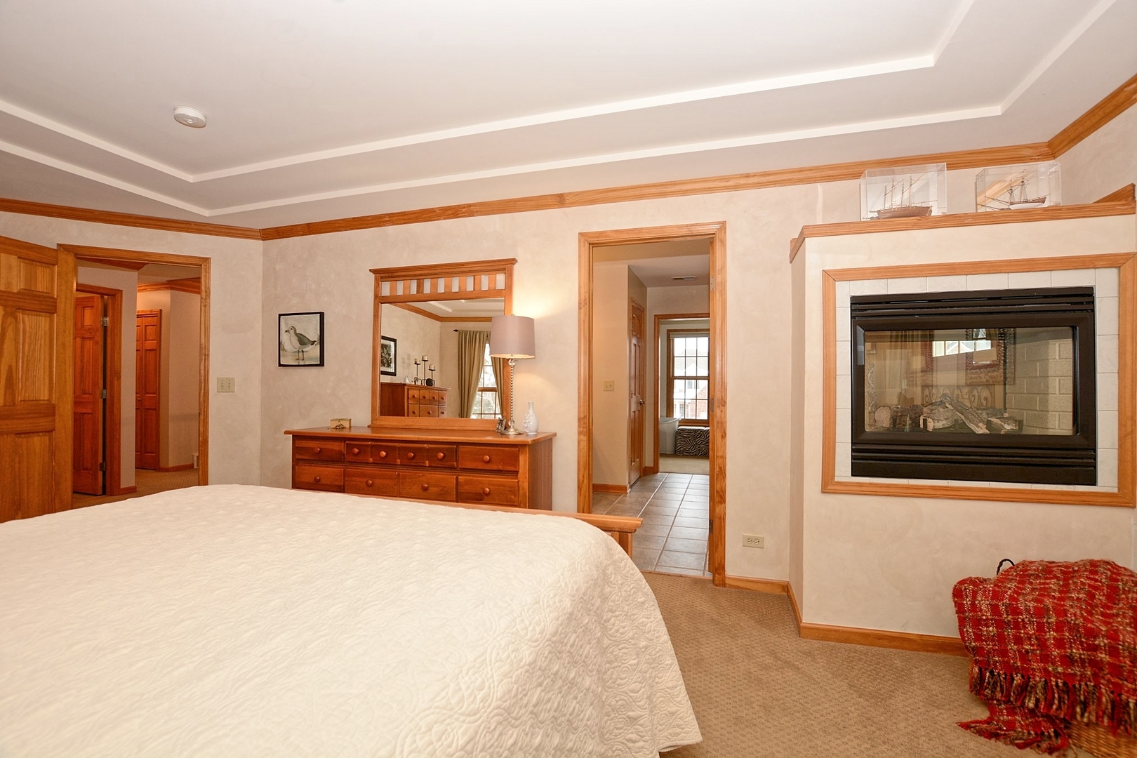 916 Merrill New Road Sugar Grove, IL 60554 - Photo 15 of 23 a bedroom with a bed and dresser with mirror