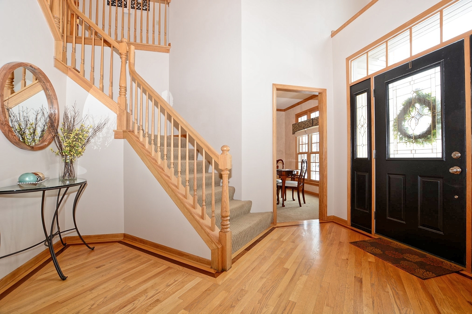 916 Merrill New Road Sugar Grove, IL 60554 - Photo 9 of 23 a view of an entryway with wooden floor and windows