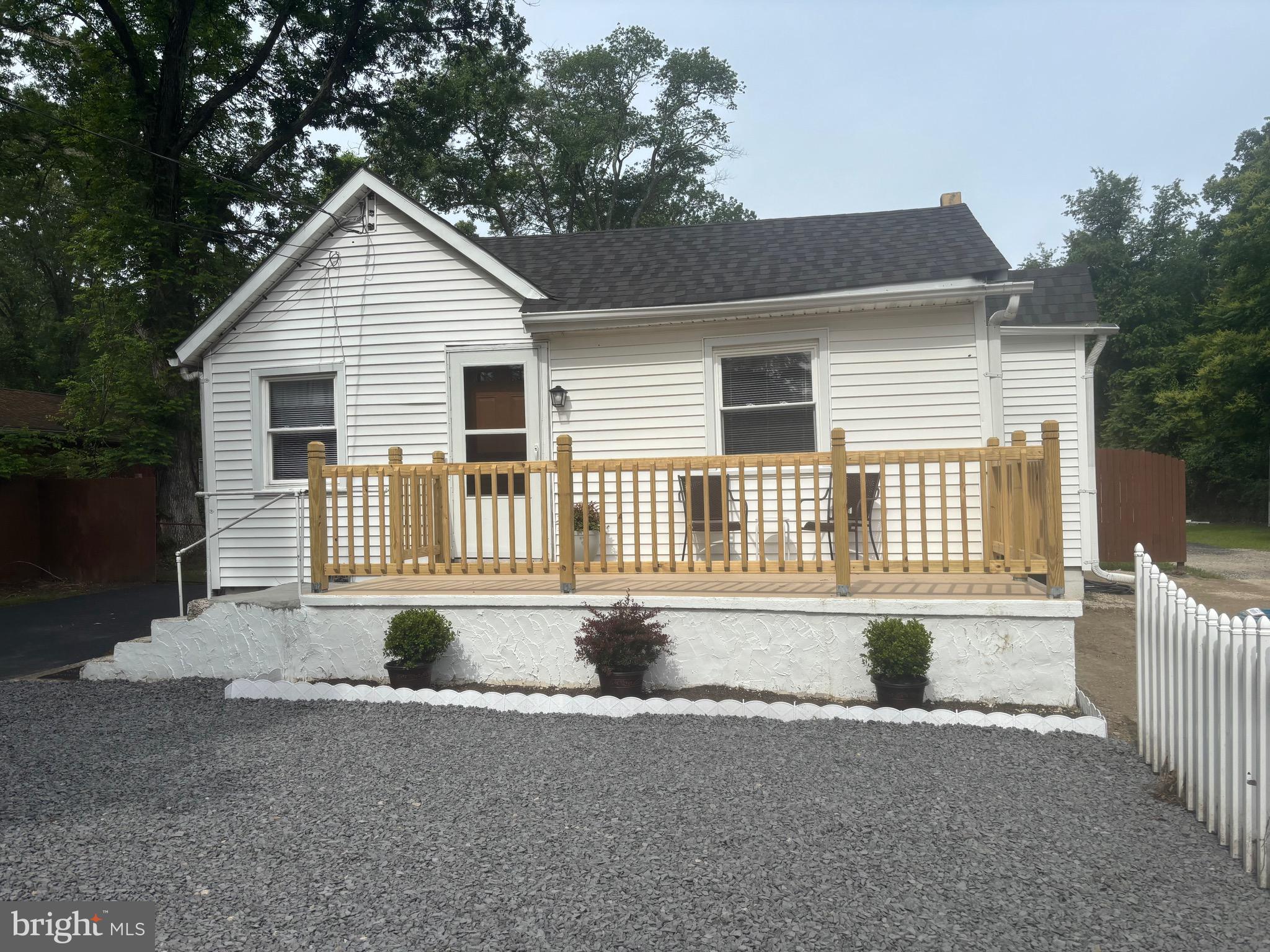 1601 Highway 206 Tabernacle, NJ 08088 - Photo 12 of 12 a front view of a house with a yard and garage