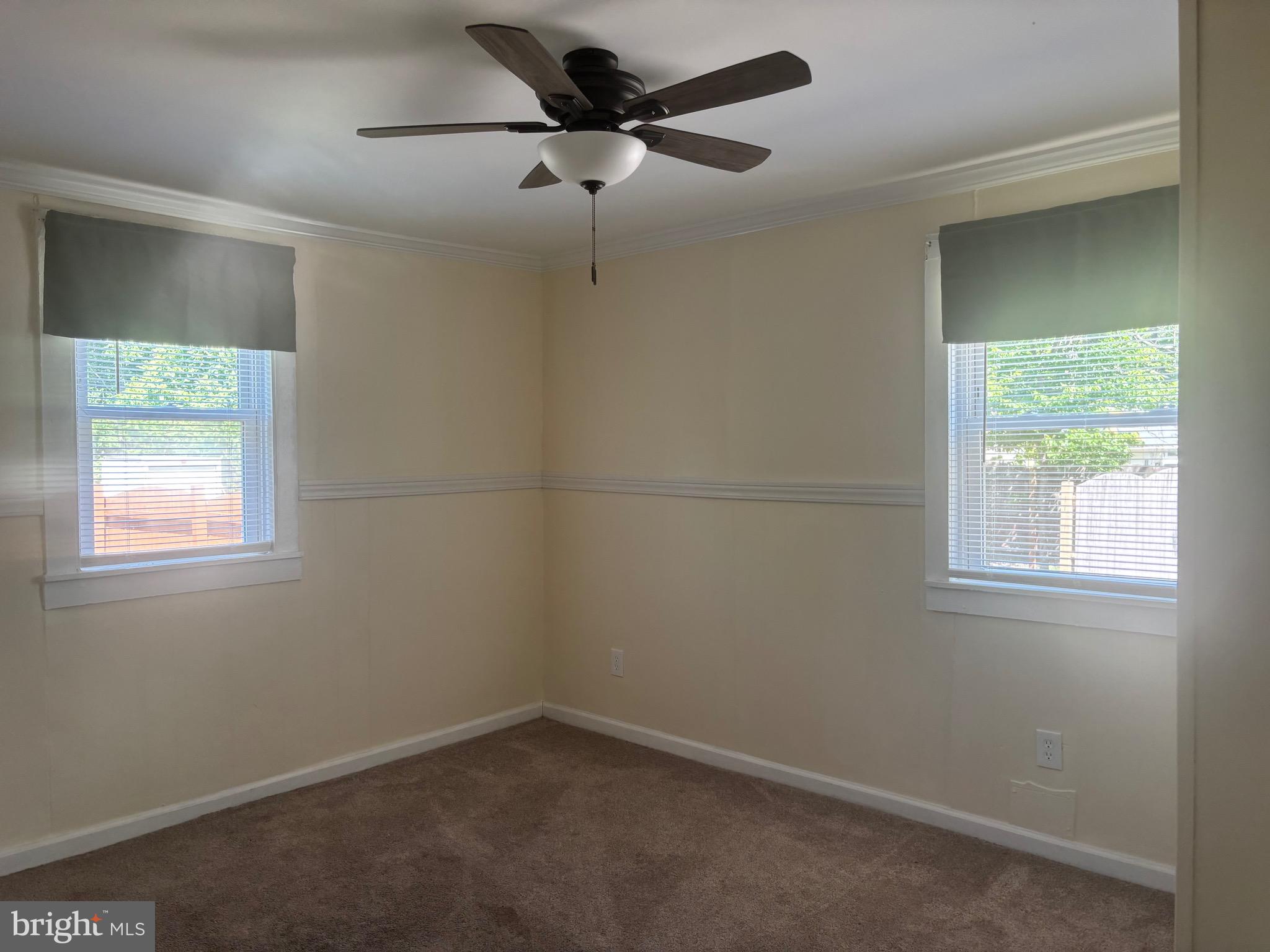 1601 Highway 206 Tabernacle, NJ 08088 - Photo 9 of 12 an empty room with a window and a fan