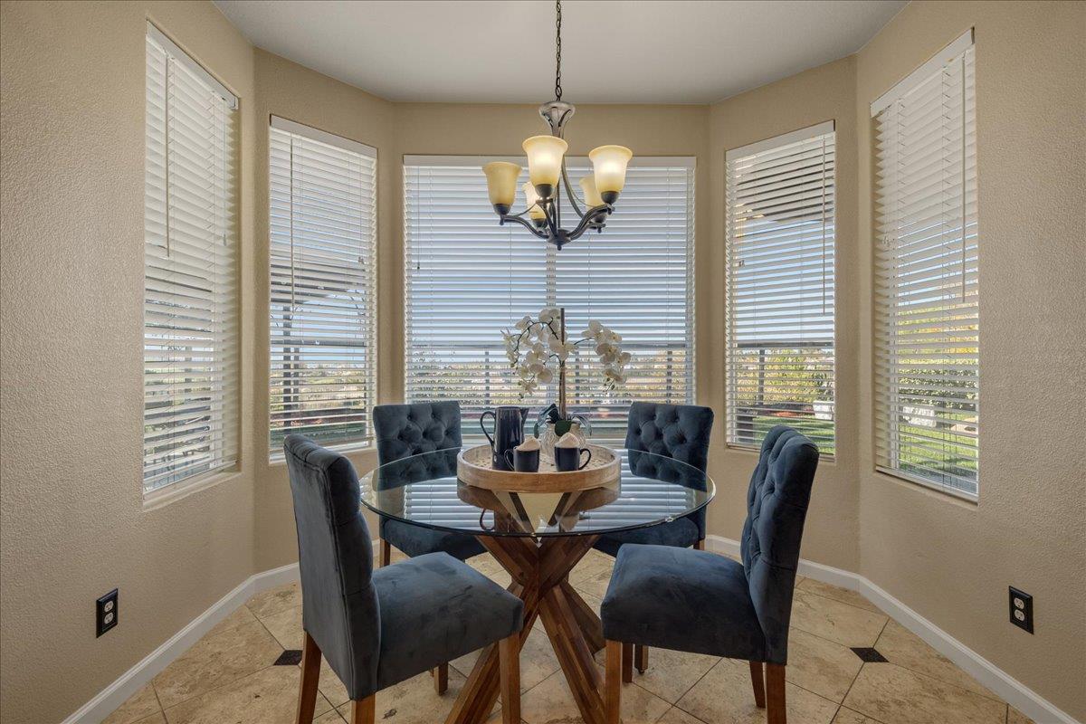 6315 Skywalker Drive San Jose, CA 95135 - Photo 13 of 34 a dining room with furniture and window