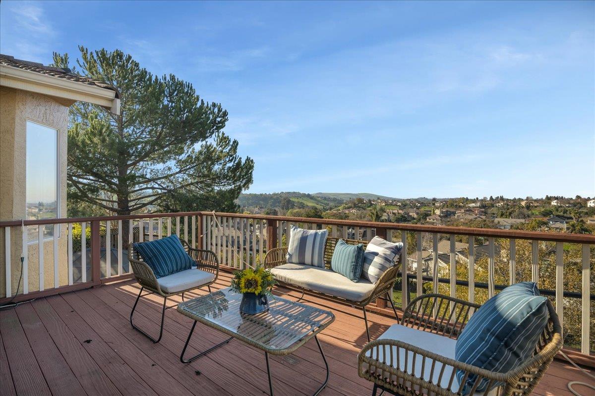 6315 Skywalker Drive San Jose, CA 95135 - Photo 17 of 34 a roof deck with couches and wooden floor