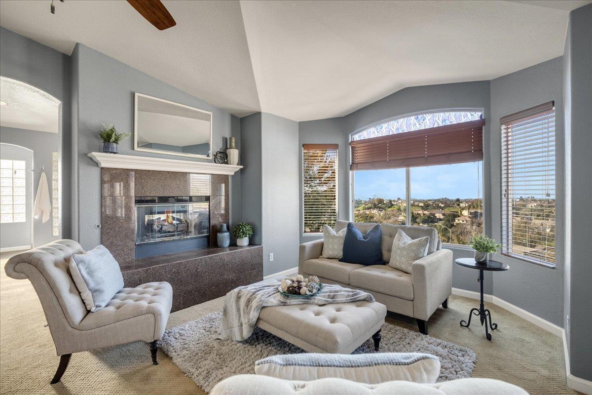 6315 Skywalker Drive San Jose, CA 95135 - Photo 18 of 34 a living room with furniture and a fireplace