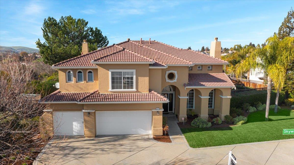 6315 Skywalker Drive San Jose, CA 95135 - Photo 2 of 34 a front view of a house with a garden